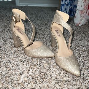 Gold sparkly shoes that I wore for only 2 hours for a wedding!